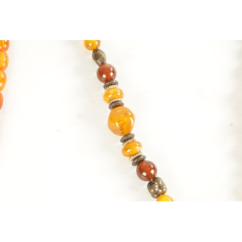 391 - A COLLECTION OF 3 AMBER NECKLACES of variated shapes and sizes 176g total. (84cm, 40cm and 90cm leng... 