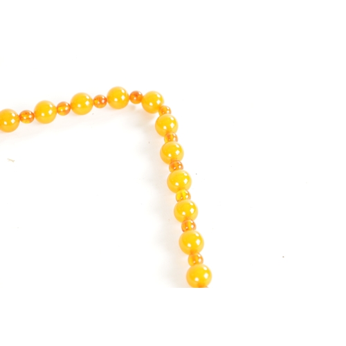 391 - A COLLECTION OF 3 AMBER NECKLACES of variated shapes and sizes 176g total. (84cm, 40cm and 90cm leng... 