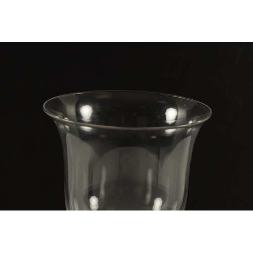 4 - A LARGE LATE 19TH CENTURY GLASS COIN GOBLET the knopped stem enclosing a silver coin dated 1877, rai... 