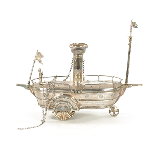 400 - AN EARLY 20TH CENTURY SILVER METAL NOVELTY TABLE LIGHTER modelled as a steam paddle boat inscribed '... 