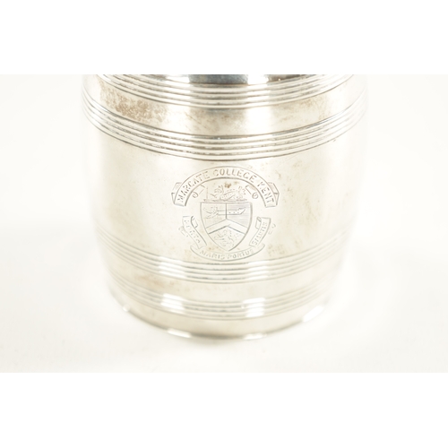 403 - A LATE GEORGE III SILVER MUSTARD POT FORMED AS BARREL with hinged lid glass liner and shaped handle.... 