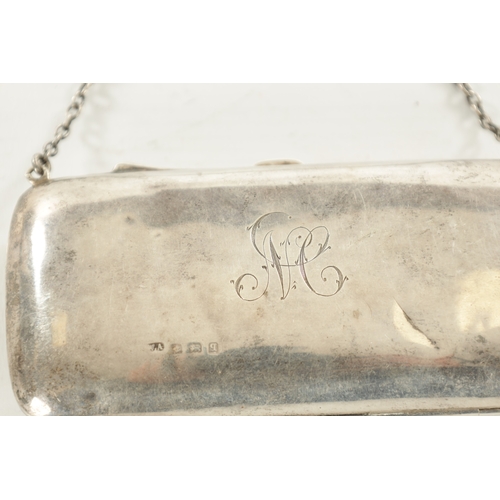 406 - TWO GEORGE V SILVER LADIES EVENING PURSES of plain and engine-turned design with leather-fitted inte... 