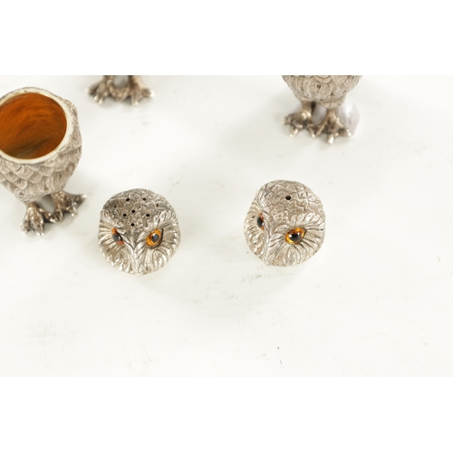 409 - A SET OF SILVER NOVELTY OWL CONDIMENTS BY GARRARD & CO. all with inset amber glass eyes, hinged head... 