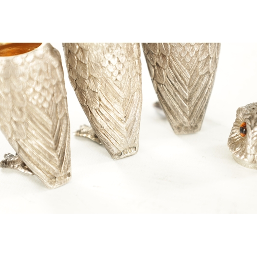 409 - A SET OF SILVER NOVELTY OWL CONDIMENTS BY GARRARD & CO. all with inset amber glass eyes, hinged head... 