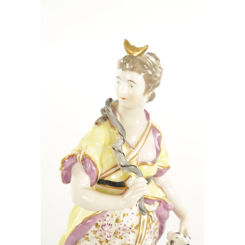 41 - AN 18TH CENTURY DERBY FIGURE OF A HUNTRESS well modelled and colourfully dressed in a forward leanin... 