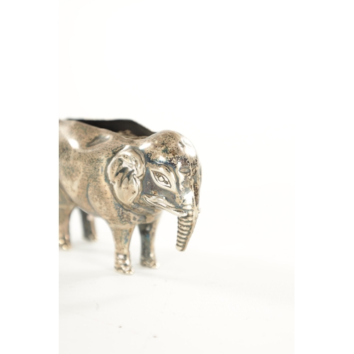 414 - AN EARLY 20TH CENTURY SILVER NOVELTY PIN CUSHION Modelled as an elephant - Birmingham. (68mm wide)