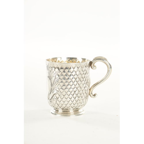 422 - A VICTORIAN SILVER FOOTED MUG with chequered diamond body and scroll handle by Edward Ker Reid, Lond... 