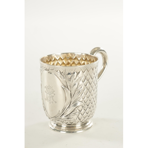 422 - A VICTORIAN SILVER FOOTED MUG with chequered diamond body and scroll handle by Edward Ker Reid, Lond... 