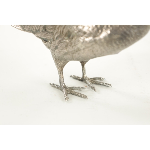 426 - A PAIR OF ELIZABETH II CAST SILVER GAME BIRD SCULPTURES each realistically modelled as a cock and he... 