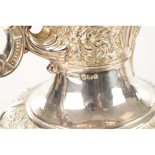 433 - A FINE QUALITY VICTORIAN SILVER FOUR-PIECE TEA SERVICE the Cellini pattern having embossed masks, an... 