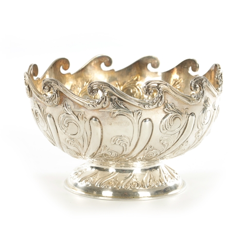 442 - A VICTORIAN SILVER FOOTED ROSE BOWL with fluted leaf cast body and waved rim, London, 1834, 994g