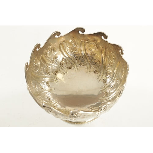 442 - A VICTORIAN SILVER FOOTED ROSE BOWL with fluted leaf cast body and waved rim, London, 1834, 994g