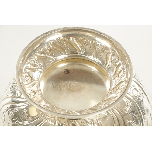 442 - A VICTORIAN SILVER FOOTED ROSE BOWL with fluted leaf cast body and waved rim, London, 1834, 994g