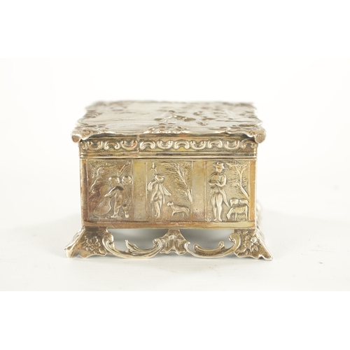 449 - A LATE 19TH CENTURY DUTCH SILVER BOX embossed with classical farming scenes to the edges and hunting... 