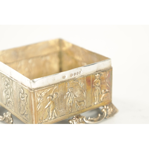 449 - A LATE 19TH CENTURY DUTCH SILVER BOX embossed with classical farming scenes to the edges and hunting... 