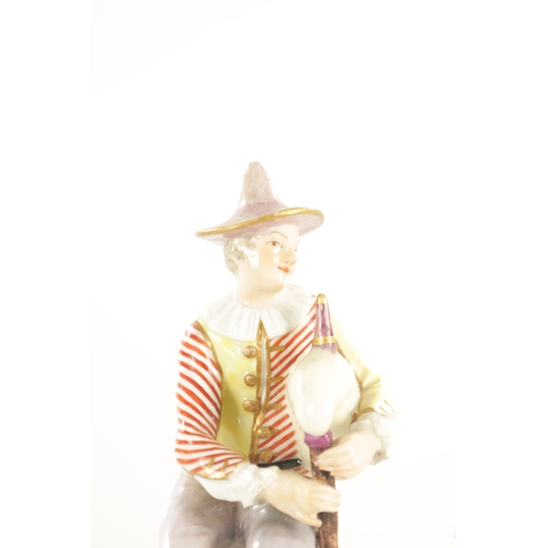 45 - A PAIR OF 18TH CENTURY MEISSEN PORCELAIN FIGURES OF MUSICIANS depicting figures playing instruments.... 