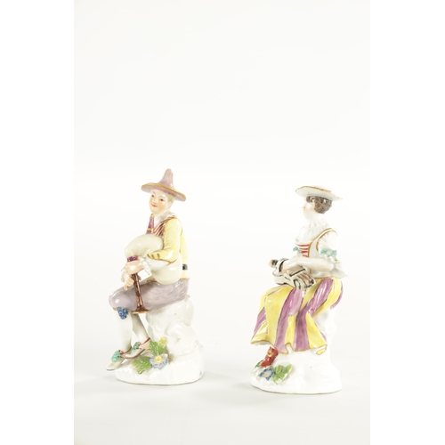 45 - A PAIR OF 18TH CENTURY MEISSEN PORCELAIN FIGURES OF MUSICIANS depicting figures playing instruments.... 