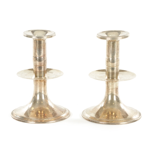 452 - A PAIR OF FILLED SILVER GOVERNOR WINSLOW CANDLESTICKS BY TUTTLE of flared form with central drip tra... 