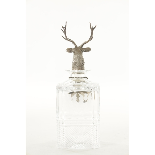 456 - A SQUARE MOULDED AND ENGRAVED SCOTCH WHISKEY DECANTER with hallmarked silver label and cast stags he... 