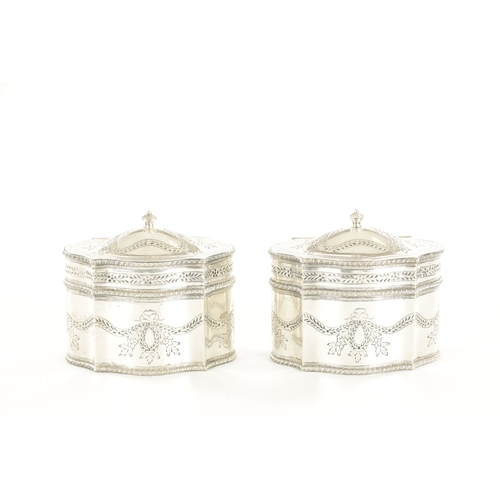 469 - A PAIR OF LATE 19TH CENTURY DUTCH SILVER TEA CADDIES of shaped oval form having gadrooned borders, e... 