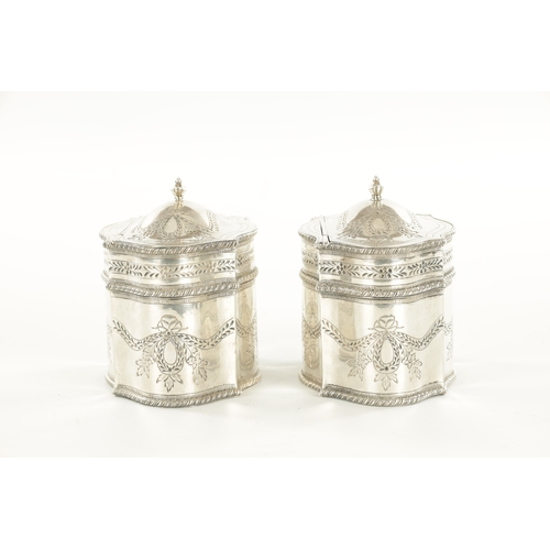 469 - A PAIR OF LATE 19TH CENTURY DUTCH SILVER TEA CADDIES of shaped oval form having gadrooned borders, e... 