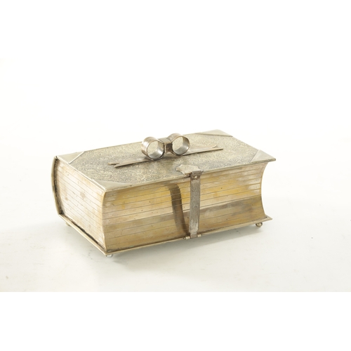 470 - A LATE 19TH CENTURY SILVER PLATED NOVELTY BISCUIT BOX FORMED AS A BOOK with Victorian registration m... 