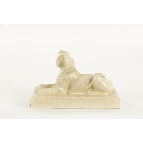 57 - RICHARD JOYCE FOR PILKINGTON, A ROYAL LANCASTRIAN PAPERWEIGHT formed as a sphinx (18cm long)