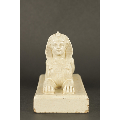 57 - RICHARD JOYCE FOR PILKINGTON, A ROYAL LANCASTRIAN PAPERWEIGHT formed as a sphinx (18cm long)