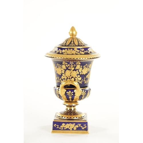 58 - A 19TH CENTURY CAMPANA SHAPED WEDGWOOD URN SHAPED VASE AND COVER of typical form, royal blue ground ... 