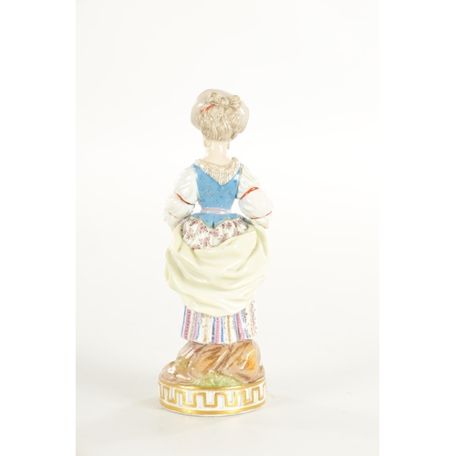 63 - A 19TH CENTURY MEISSEN FLOWER SELLER FIGURINE the colourful standing young lady displaying flower ga... 