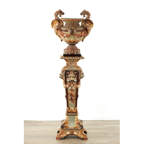 74 - A 19TH CENTURY CONTINENTAL MAJOLICA JARDINIERE ON STAND BY WILHELM SCHILLER & SONS, decorated with d... 