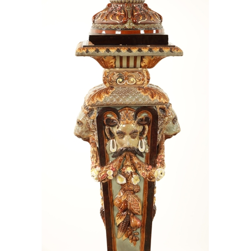 74 - A 19TH CENTURY CONTINENTAL MAJOLICA JARDINIERE ON STAND BY WILHELM SCHILLER & SONS, decorated with d... 