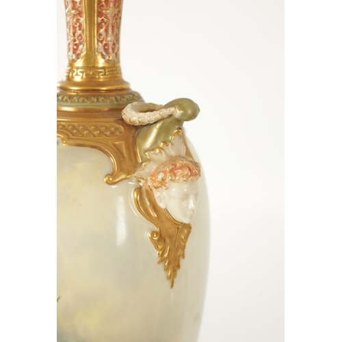 76 - A LARGE EARLY 20TH CENTURY ROYAL WORCESTER VASE BY JOHN STINTON of slender form with masked side han... 