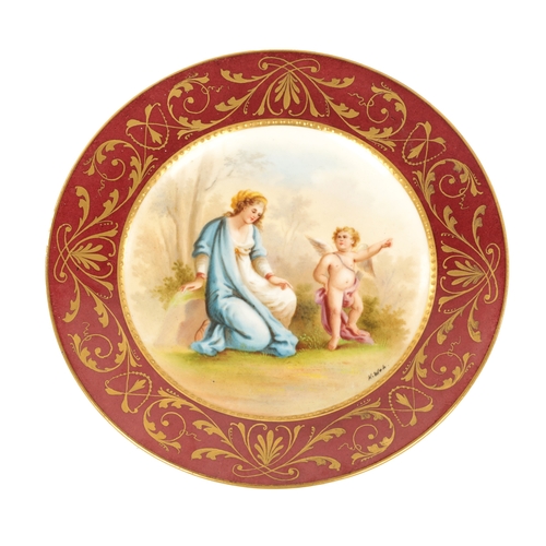 78 - A SMALL LATE 19TH CENTURY VIENNA STYLE PLATE decorated with an over-gilded scrolling foliated maroon... 