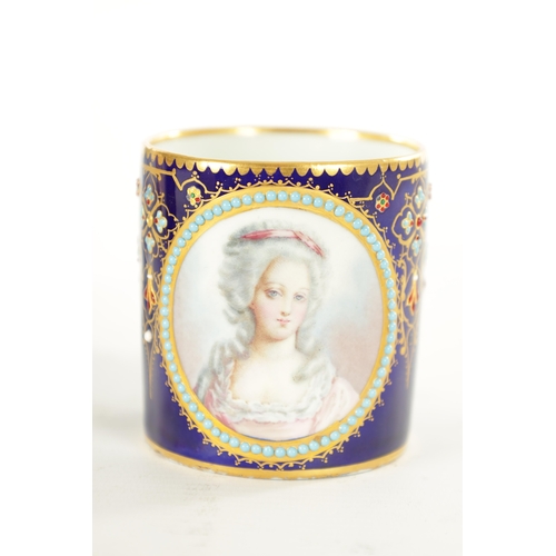 83 - A FINE 18TH CENTURY SEVRES GILT AND ROYAL BLUE GROUND PORTRAIT CUP AND SAUCER painted with a titled ... 