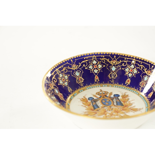 83 - A FINE 18TH CENTURY SEVRES GILT AND ROYAL BLUE GROUND PORTRAIT CUP AND SAUCER painted with a titled ... 