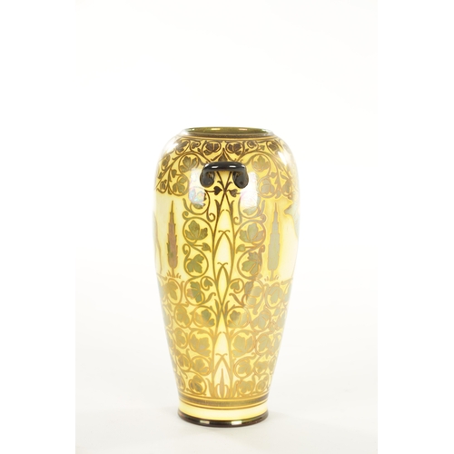 86 - AN EARLY 20TH CENTURY PILKINGTON'S ROYAL LANCASTRIAN LUSTRE TWIN HANDLED VASE BY JESSIE JONES of sli... 