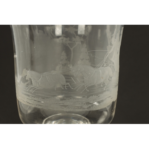 9 - AN OVERSIZED 19TH-CENTURY GLASS ENGRAVED GOBLET the body decorated with a horse-drawn coach inscribe... 