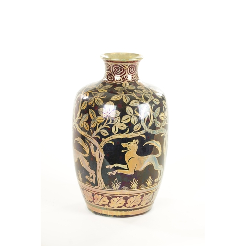91 - AN EARLY 20TH CENTURY ROYAL LANCASTRIAN LUSTRE VASE BY RICHARD JOYCE of shouldered ovoid form with s... 