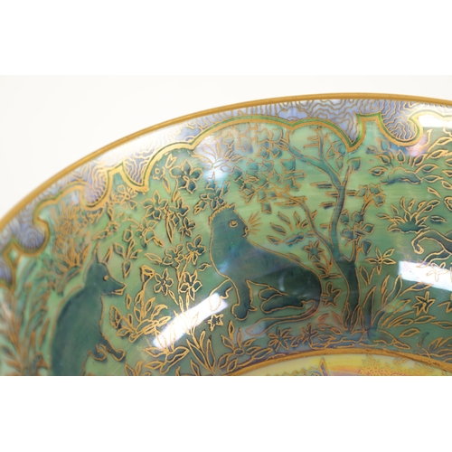 93 - AN EARLY 20TH CENTURY WEDGWOOD FAIRYLAND LUSTRE BOWL in the Nizami pattern designed by Daisy Makeig-... 