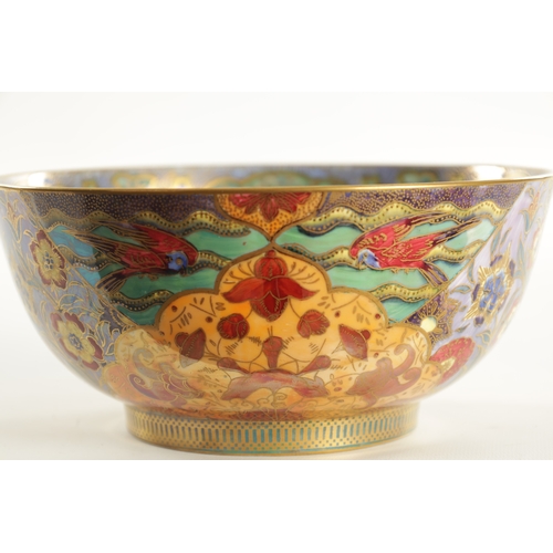 93 - AN EARLY 20TH CENTURY WEDGWOOD FAIRYLAND LUSTRE BOWL in the Nizami pattern designed by Daisy Makeig-... 