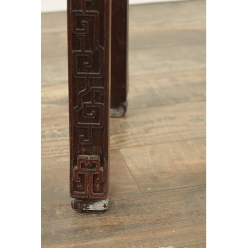 96 - A 19TH CENTURY CHINESE HARDWOOD ALTER TABLE with geometric blind carved designs to the fronts; raise... 