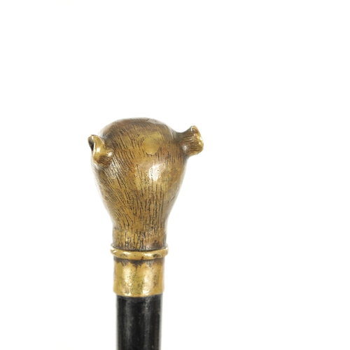 732 - A LATE 19TH CENTURY BRASS AND EBONY WALKING STICK with brass cast monkey head pommel (93cm overall )