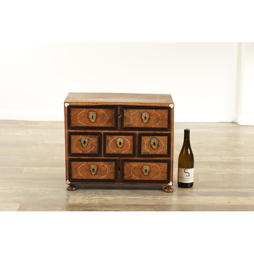 1357 - A GOOD LATE 17TH CENTURY CONTINENTAL WALNUT AND BONE INLAID TABLE CABINET with ebonised mouldings an... 