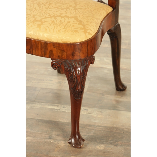 1404 - A QUEEN ANNE FIGURED WALNUT SIDE CHAIR with a solid vase-shaped splat, drop-in seat and raised on le... 