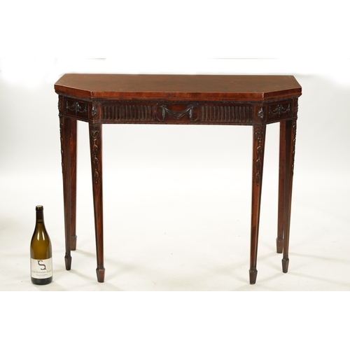 1406 - A LATE GEORGIAN ADAM-STYLE MAHOGANY CARD TABLE with ribbon and swag work carving (91cm wide 45cm dee... 