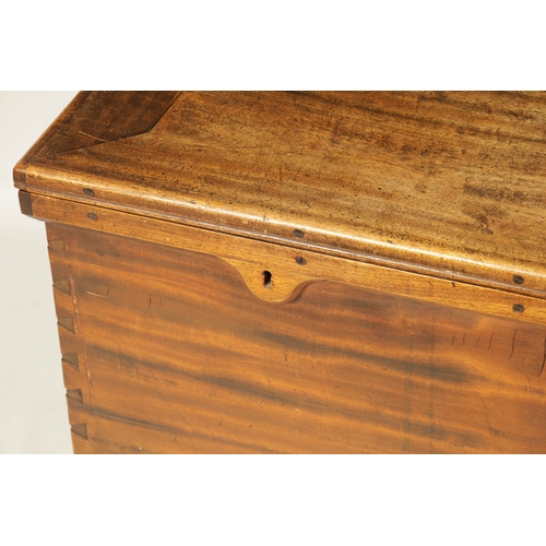 1410 - AN EARLY 19TH CENTURY CAMPHOR WOOD CHEST with a hinged lockable lid, side carrying handles and plint... 