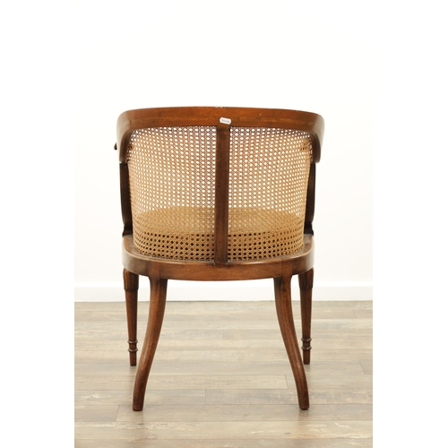 1413 - AN EARLY 20TH CENTURY ADAM STYLE MAHOGANY BERGERE CHAIR with rams head arms and leaf-carved decorati... 