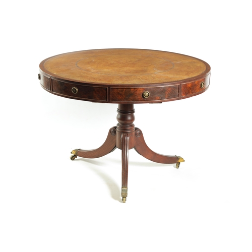 1418 - A REGENCY FLAME MAHOGANY DRUM TABLE with a leather top above a shallow freeze with fitted drawers, r... 