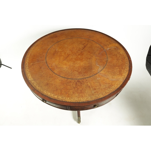 1418 - A REGENCY FLAME MAHOGANY DRUM TABLE with a leather top above a shallow freeze with fitted drawers, r... 